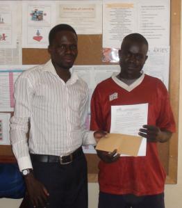 Ojara Benson receiving micro credit